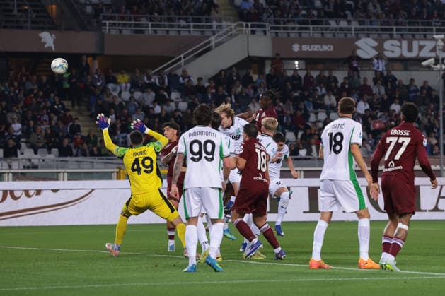 Turin, Italy, 8th May 2026. Alieu Njie of Torino FC climbs above the Sassuolo defence only to head over the crossbar during the Torino vs Sassuolo Serie A match at Stadio Grande Torino, Turin. Picture credit should read: Jonathan Moscrop Sportimage EDITORIAL USE ONLY. No use with unauthorised audio, video, data, fixture lists, club league logos or live services. Online in-match use limited to 120 images, no video emulation. No use in betting, games or single club league player publications. SPI_003_JM_TORO_SASSUOLO SPI-4758-0003