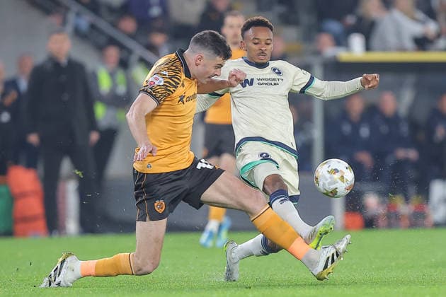 Hull City v Millwall Sky Bet Championship John Egan of Hull City and Thierno Ballo of Millwall challenge for the ball lduring the Sky Bet Championship Play-Off Semi-Final First Leg match at the MKM Stadium, Hull 08 05 2026 UK Newspapers OUT Copyright: xDavidxGreavesx FIL-23400-0071