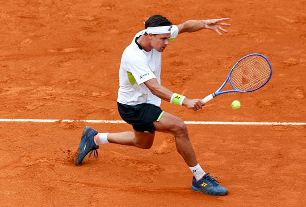 (260509) -- ROME, May 9, 2026 -- Daniel Altmaier hits a return during the men s singles second round match between Alexander Zverev of Germany and Daniel Altmaier of Germany at the ATP, Tennis Herren Italian Open in Rome, Italy, May 8, 2026. ) (SP)ITALY-ROME-TENNIS-ATP-ITALIAN OPEN-MEN S SINGLES WangxKaiyan 