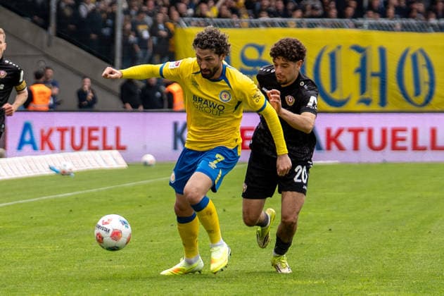 Deutschland: Fussball, 2. Bundesliga, 33. Spieltag 2025 26, Eintracht Braunschweig - Dynamo Dresden am 09.05. in Braunschweig, Eintracht-Stadion: Fabio Kaufmann (Eintracht Braunschweig 7) Ben Bobzien (Dynamo Dresden 20)
