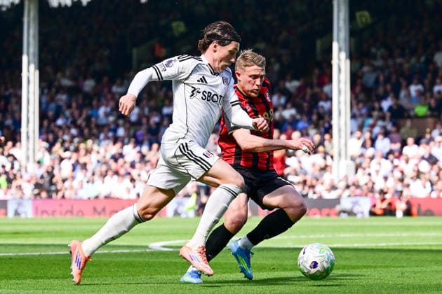 Fulham FC v AFC Bournemouth, Premier League Fulham forward Harry Wilson (8) under pressure from AFC Bournemouth defender Adrien Truffert (3) during the Premier League match between Fulham FC and AFC Bournemouth at Craven Cottage, London, UK on 9 May 2026. London Craven Cottage Greater London UK Editorial use only DataCo restrictions apply See www.football-dataco.com , Copyright: xDennisxGoodwinx PSI-24220-0032