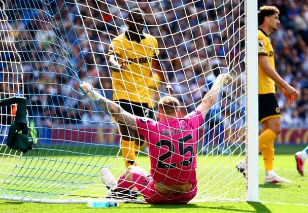 Daniel Bentley of Wolverhampton Wanderers falls into the net after making a save from Danny Welbeck of Brighton and Hove Albion. Brighton and Hove Albion v Wolverhampton Wanderers, Premier League, Football, American Express Community Stadium, Brighton , UK - 09 May 2026Brighton American Express Community Stadi United Kingdom EDITORIAL USE ONLY No use with unauthorised audio, video, data, fixture lists, club league logos or live services. Online in-match use limited to 120 images, no video emulation. No use in betting, games or single club league player publications. Copyright: xJamesxMarsh Shutterstockx 16861685ak