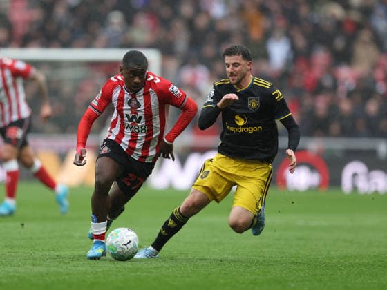Sunderland, England, 9th May 2026. Noah Sadiki (L) of Sunderland in action with Mason Mount of Manchester United, ManU during the Sunderland vs Manchester United Premier League match at the Stadium Of Light, Sunderland. Picture credit should read: Nigel Roddis Sportimage EDITORIAL USE ONLY. No use with unauthorised audio, video, data, fixture lists, club league logos or live services. Online in-match use limited to 120 images, no video emulation. No use in betting, games or single club league player publications. SPI_010_NR_SUND_MANC SPI-4790-0010