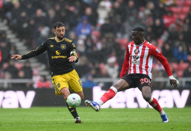 Bruno Fernandes of Manchester United, ManU challenges Nordi Mukiele for Sunderland during the Premier League 2025 26 League match between Sunderland and Manchester United at Stadium of Light on May 9th, 2026 in Sunderland, England. Copyright: xRichardxLee SportsxPressxPhotox Sportspressphoto_SPR143049