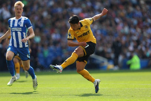 Football - 2025 2026 Premier League - Brighton & Hove Albion vs Wolverhampton Wanderers - The Amex - Saturday 9th May 2026 Hwang Hee-Chan of Wolverhampton has a shot during the Premier League match at the Amex Stadium COLORSPORT Shaun Boggust 