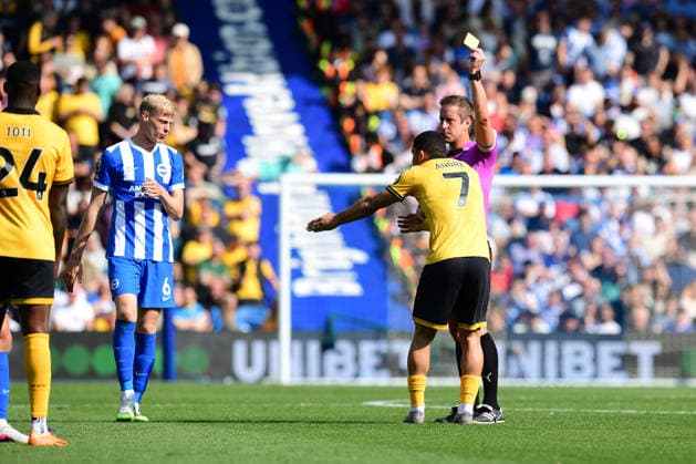 Brighton and Hove Albion v Wolverhampton Wanderers, Premier League YELLOW CARD issued to Andre Midfielder of Wolverhampton Wanderers during the Premier League match between Brighton and Hove Albion and Wolverhampton Wanderers at the American Express Stadium, Brighton and Hove, UK on 9 May 2026. Brighton and Hove American Express Stadium East Sussex UK Editorial use only DataCo restrictions apply See www.football-dataco.com , Copyright: xJeffxMoodx PSI-24230-0034