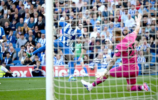 Yankuba Minteh of Brighton beats Dan Bentley of Wolves to make it three nil to Brighton during the Premier League match between Brighton and Hove Albion and Wolverhampton Wanderers at the American Express Stadium, Brighton UK - Saturday 9th May 2026 Brighton v Wolves Premier League Football, Amex Stadium, Sussex, UK - 09 May 2026Brighton Amex Stadium Sussex United Kingdom EDITORIAL USE ONLY No use with unauthorised audio, video, data, fixture lists, club league logos or live services. Online in-match use limited to 120 images, no video emulation. No use in betting, games or single club league player publications. . No mer Copyright: xLizxFinlayson TPI Shutterstockx 16867427aw
