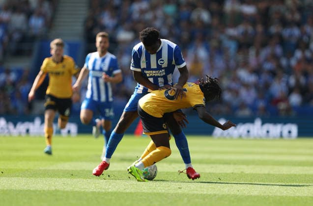 Football - 2025 2026 Premier League - Brighton & Hove Albion vs Wolverhampton Wanderers - The Amex - Saturday 9th May 2026 Carlos Baleba of Brighton and Mateus Mane of Wolverhampton in action during the Premier League match at the Amex Stadium COLORSPORT Shaun Boggust 