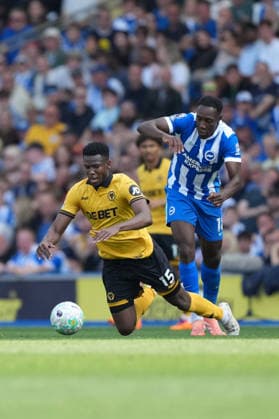 Brighton and Hove Albion v Wolverhampton, Premier League, Football, Amex Stadium, Brighton, UK - 09 May 2026 Yerson Mosquera of Wolves brought down by Danny Welbeck of Brighton. Brighton Amex Stadium Brighton UK, UK NEWSPAPERS OUT Copyright: xSeanxRyanx