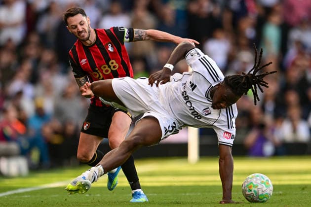 Fulham FC v AFC Bournemouth, Premier League AFC Bournemouth defender Adam Smith (15) fouls Fulham defender Calvin Bassey (3) during the Premier League match between Fulham FC and AFC Bournemouth at Craven Cottage, London, UK on 9 May 2026. London Craven Cottage Greater London UK Editorial use only DataCo restrictions apply See www.football-dataco.com , Copyright: xDennisxGoodwinx PSI-24220-0066