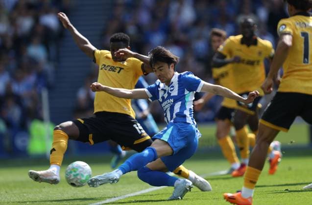 Premier League - Brighton & Hove Albion v Wolverhampton Wanderers BRIGHTON, ENGLAND, MAY 09: Kaoru Mitoma of Brighton & Hove Albion has a shot on goal during the Premier League match between Brighton & Hove Albion v Wolverhampton Wanderers at the AMEX Community Stadium, Brighton, England, on May 9. (Photo by Daniel Weir) Brighton AMEX Community Stadium England Copyright: xDanielxWeir SportsxPressxPhotox Sportspressphoto_SPR143213