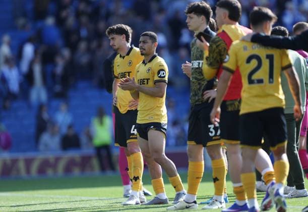 Premier League - Brighton & Hove Albion v Wolverhampton Wanderers BRIGHTON, ENGLAND, MAY 09: Santiago Bueno of Wolverhampton Wanderers & Andre of Wolverhampton Wanderers looks disappointed & dejected after the loss during the Premier League match between Brighton & Hove Albion v Wolverhampton Wanderers at the AMEX Community Stadium, Brighton, England, on May 9. (Photo by Daniel Weir) Brighton AMEX Community Stadium England Copyright: xDanielxWeir SportsxPressxPhotox Sportspressphoto_SPR143215