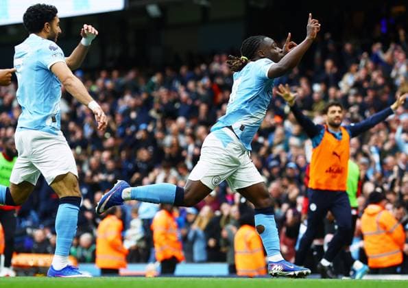 Jeremy Doku of Manchester City celebrates scoring the opening goal Manchester City v Brentford, Premier League, Football, Etihad Stadium, Manchester , UK - 09 May 2026Manchester Etihad Stadium United Kingdom EDITORIAL USE ONLY No use with unauthorised audio, video, data, fixture lists, club league logos or live services. Online in-match use limited to 120 images, no video emulation. No use in betting, games or single club league player publications. Copyright: xMattxWest Shutterstockx 16861722y