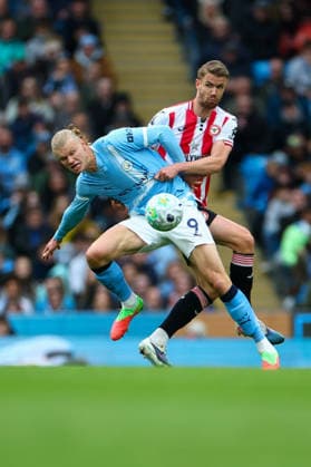 9th May 2026; Etihad Stadium, Manchester, Lancashire, England; Premier League Football, Manchester City versus Brentford; Erling Haaland of Manchester City is under pressure from Kristoffer Ajer of Brentford RogerxEvans