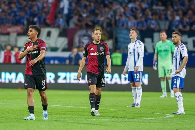Henri Koudossou 8 (1FC Nuernberg), links, jubelt ueber sein Tor zum 2:0, mit Julian Justvan 10 (1FC Nuernberg), 1. FC Nuernberg vs. FC Schalke 04, Fussball, Maenner, 2. Bundesliga, DFL, Saison 2025 2026, 33. Spieltag, Rueckrunde, 09.05.2026 DFB regulations prohibit any use of photographs as image sequences and or quasi-video Nuernberg Bayern Deutschland