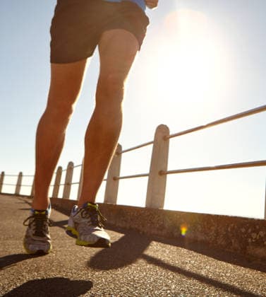 Learn to love the burn. a man jogging on the promenade (License=RF) 20263189 ,model released, Symbolfoto  Copyright: xZoonar.com KasperxRavlox 20263189 ,model released, Symbolfoto ,property released