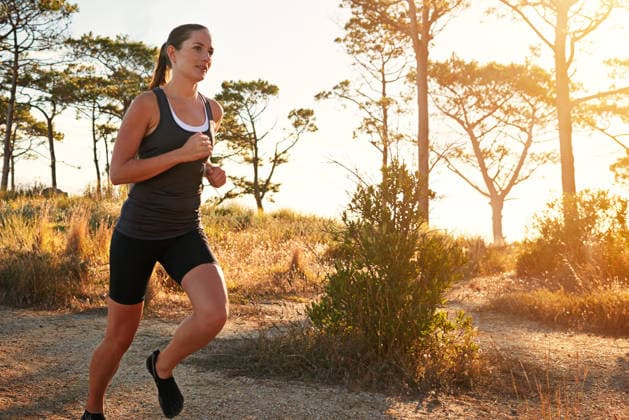 Experience nature with a trail run. a young woman doing a trail run (License=RF) 20294977 ,model released, Symbolfoto  Copyright: xZoonar.com YurixArcursx 20294977 ,model released, Symbolfoto ,property released