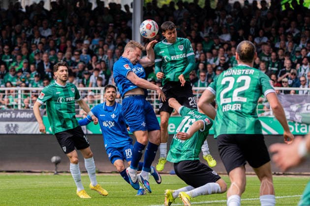 Münster, Deutschland 10. Mai 2026: 2. BL - 2025 2026 - Sp. 33 - SC Preußen Münster gegen SV Darmstadt 98 Im Bild: v. li. im Zweikampf Niklas Schmidt (Darmstadt) und Marco Meyerhoefer (PRM) DFL DFB regulations prohibit any use of photographs as image sequences and or quasi-video LVM Preussenstadion Nordrhein Westfalen