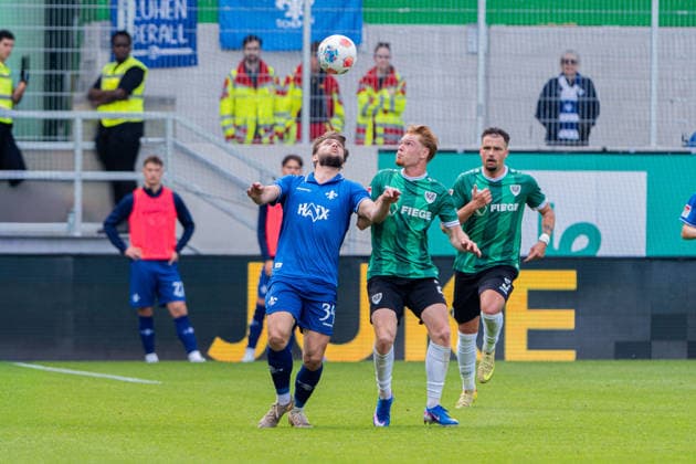 Münster, Deutschland 10. Mai 2026: 2. BL - 2025 2026 - Sp. 33 - SC Preußen Münster gegen SV Darmstadt 98 Im Bild: v. li. im Zweikampf Killian Corredor (Darmstadt) und Luca Bolay (PRM) DFL DFB regulations prohibit any use of photographs as image sequences and or quasi-video LVM Preussenstadion Nordrhein Westfalen