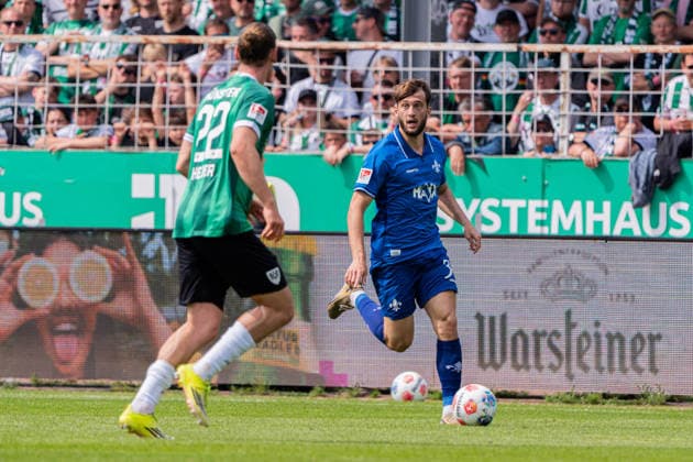 Münster, Deutschland 10. Mai 2026: 2. BL - 2025 2026 - Sp. 33 - SC Preußen Münster gegen SV Darmstadt 98 Im Bild: v. li. im Zweikampf Jannis Heuer (PRM) und Killian Corredor (Darmstadt) DFL DFB regulations prohibit any use of photographs as image sequences and or quasi-video LVM Preussenstadion Nordrhein Westfalen