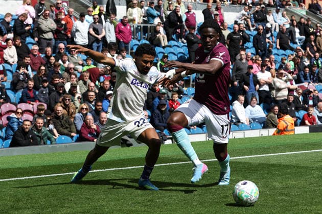 10th May 2026; Turf Moor, Burnley, Lancashire, England; Premier League Football, Burnley versus Aston Villa; Ian Maatsen of Aston Villa competes for the ball with Loum Tchaouna of Burnley DavidxBlunsden