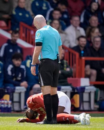 Premier League: Nottingham Forest v Newcastle Untied Dilane Bakwa of Nottingham Forest receives treatment during the Premier League match Nottingham Forest vs Newcastle Untied at City Ground, Nottingham, United Kingdom on 10 May 2026 (Photo by Maynard Manyowa News Images) Nottingham City Ground Nottinghamshire United Kingdom Copyright: xMaynardxManyowa NewsxImagesx