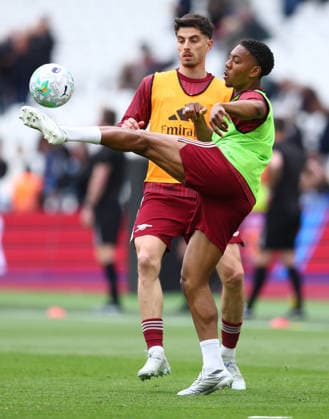 London, England, 10th May 2026. Myles Lewis-Skelly of Arsenal and Kai Havertz of Arsenal warm up before the West Ham United vs Arsenal Premier League match at the London Stadium, London. Picture credit should read: Paul Terry Sportimage EDITORIAL USE ONLY. No use with unauthorised audio, video, data, fixture lists, club league logos or live services. Online in-match use limited to 120 images, no video emulation. No use in betting, games or single club league player publications. SPI_006_PT_West_Ham_Arsenal SPI-4793-0006