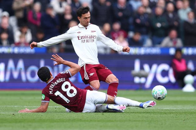 London, England, 10th May 2026. Mateus Fernandes of West Ham United and Martin Zubimendi of Arsenal challenge for the ball during the West Ham United vs Arsenal Premier League match at the London Stadium, London. Picture credit should read: Paul Terry Sportimage EDITORIAL USE ONLY. No use with unauthorised audio, video, data, fixture lists, club league logos or live services. Online in-match use limited to 120 images, no video emulation. No use in betting, games or single club league player publications. SPI_026_PT_West_Ham_Arsenal SPI-4793-0026