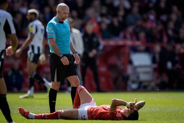 Nottingham Forest v Newcastle United - Premier League Nicolas Dominguez of Nottingham Forest receives treatment during the Premier League match between Nottingham Forest and Newcastle United at City Ground in Nottingham, United Kingdom, on May 10, 2026. Nottingham Nottinghamshire United Kingdom  Copyright: xNewsxImagesx originalFilename:cosgrove-premierl260510_np5pt.jpg
