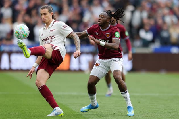 10th May 2026; London Stadium, London, England; Premier League Football, West Ham United versus Arsenal; Riccardo Calafiori of Arsenal feels pressure from Soungoutou Magassa of West Ham United HenningxvonxJagow