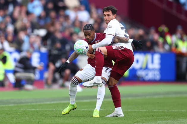 London, England, 10th May 2026. Crysencio Summerville of West Ham United and Martin Zubimendi of Arsenal challenge for the ball during the West Ham United vs Arsenal Premier League match at the London Stadium, London. Picture credit should read: Paul Terry Sportimage EDITORIAL USE ONLY. No use with unauthorised audio, video, data, fixture lists, club league logos or live services. Online in-match use limited to 120 images, no video emulation. No use in betting, games or single club league player publications. SPI_028_PT_West_Ham_Arsenal SPI-4793-0028