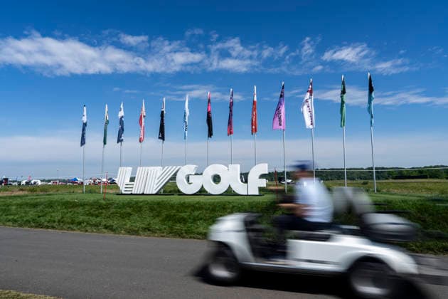 STERLING, VIRGINIA - MAY 10: A general view of a statue of the LIV Golf logo with a motion blurred golf cart driving past in the foreground during day 4 of LIV Golf Virginia at Trump National Golf Club on May 10, 2026 in Sterling, Virginia. (Photo by Ben Hsu Icon Sportswire) GOLF: MAY 10 LIV Golf Virginia EDITORIAL USE ONLY Icon224260510001