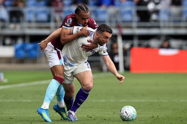 10th May 2026; Turf Moor, Burnley, Lancashire, England; Premier League Football, Burnley versus Aston Villa; Lucas Pires of Burnley competes for the ball with John McGinn of Aston Villa DavidxBlunsden