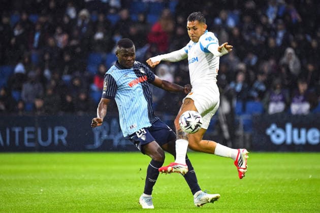 FOOTBALL : AC Le Havre vs Olympique de Marseille - Ligue 1 McDonald s - JournÃ e 33 - 10 05 2026 Facundo Medina (OM) Ally Samatta (AC Le Havre) Le HavreFrance  Copyright: xBaptistexAutissierx