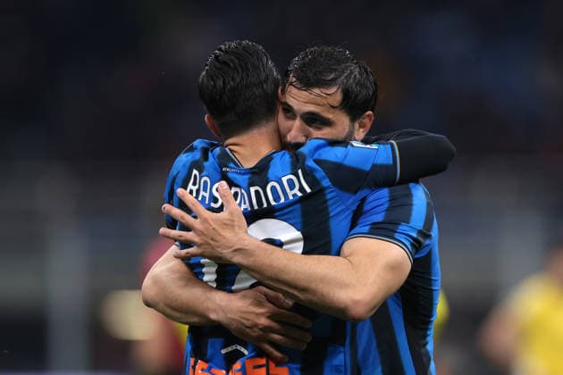 Milan, Italy, 10th May 2026. Giacomo Raspadori of Atalanta celebrates with team mate Sead Kolasinac after scoring to give the visitors a 3-0 lead during the AC Milan vs Atalanta Serie A match at Giuseppe Meazza, Milan. Picture credit should read: Jonathan Moscrop Sportimage EDITORIAL USE ONLY. No use with unauthorised audio, video, data, fixture lists, club league logos or live services. Online in-match use limited to 120 images, no video emulation. No use in betting, games or single club league player publications. SPI_047_JM_MILAN_ATALANTA SPI-4760-0047
