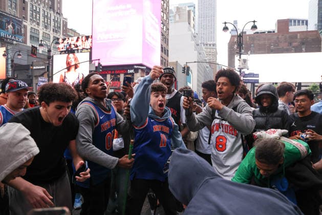New York Knicks fans celebrate their advancement to the Eastern Conference New York Knicks fans celebrate their advancement to the Eastern Conference Finals in the Madison Square Garden area in New York on the night of Sunday, May 10, 2026 New York City NY United States Copyright: xWilliamxVolcovx