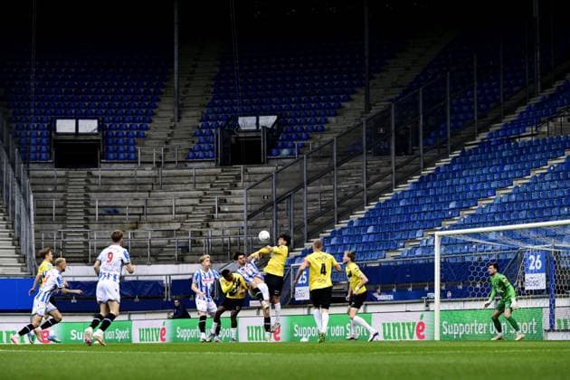 HEERENVEEN - Lasse Selvag Nordas of Heerenveen, Cherrion Valerius of NAC, Rio Hillen of NAC during the remainder of the Dutch Eredivisie match between NAC Breda and sc Heerenveen at the Abe Lenstra Stadium on May 11, 2026, in Heerenveen, the Netherlands. The match was abandoned on May 10 due to fireworks on the pitch. OLAF KRAAK ANP xVIxANPxSportx xxANPxIVx 558007555 originalFilename: 558007555.jpg
