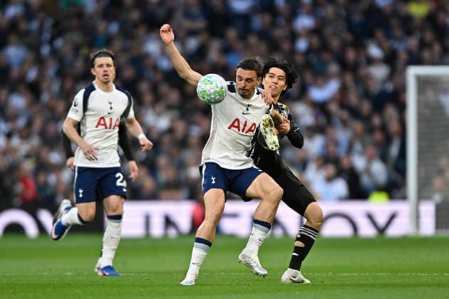 Spurs vs Leeds, Premier League Joao Palhinha of Tottenham Hotspur and Ao Tanaka of Leeds Utd clash in the opening minute during the Spurs vs Leeds Utd, Premier League match at the Tottenham Hotspur Stadium London. London Tottenham Hotspur Stadium UK Copyright: xMartinxDaltonx Spurs_vs_Leeds_110526_MD_005