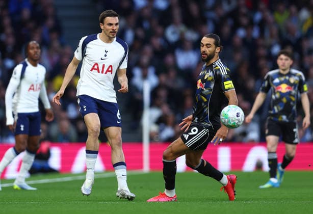London, England, 11th May 2026. Joao Palhinha of Tottenham Hotspur plays there ball past Dominic Calvert-Lewin of Leeds United during the Tottenham Hotspur vs Leeds United Premier League match at the Tottenham Hotspur Stadium, London. Picture credit should read: Paul Terry Sportimage EDITORIAL USE ONLY. No use with unauthorised audio, video, data, fixture lists, club league logos or live services. Online in-match use limited to 120 images, no video emulation. No use in betting, games or single club league player publications. SPI_015_PT_Spurs_Leeds SPI-4794-0015