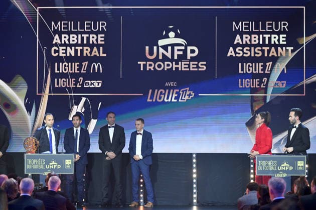Trophee UNFP 2026 Jerome BRISARD (ARBITRE) - Alexandre PERREAU NIEL (ARBITRE) - Marina LORENZO (Journaliste LIGUE 1+) - Thibault LE ROL (Journaliste LIGUE 1+) during the 2026 UNFP Trophy ceremony at Palais Brongniart on May 11, 2026 in Paris, France. Paris France  Copyright: xFEPx 776493480