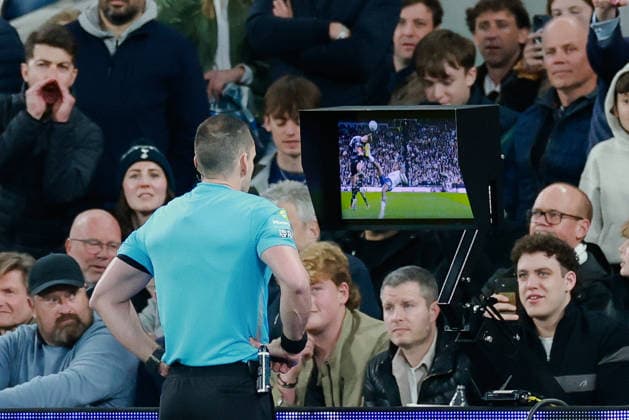 Premier League 2025 26 Tottenham Hotspur v Leeds United Tottenham Hotspur Stadium 11.05.2026 Referee, Jarred Gillett check for a penalty after Mathys Tel of Tottenham Hotspur kicks Ethan Ampadu (c) of Leeds United in the face Premier League 2025 26 Tottenham Hotspur v Leeds United Tottenham Hotspur Stadium 11.05.2026 Photograph By Marc Aspland The Times  Copyright: xMarcxAsplandx NINTCHDBPICT001079910443