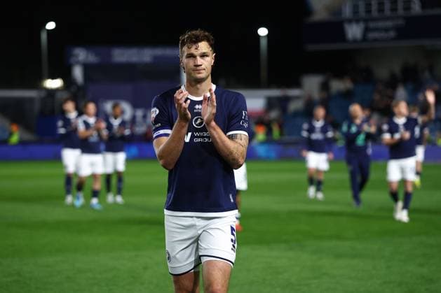 Jake Cooper of Millwall applauds fans at full time Millwall v Hull City, EFL Sky Bet Championship, Play-Off Semi Final, Second Leg, Football, The Den, London, UK - 11 May 2026London The Den United Kingdom EDITORIAL USE ONLY No use with unauthorised audio, video, data, fixture lists, club league logos or live services. Online in-match use limited to 120 images, no video emulation. No use in betting, games or single club league player publications. Copyright: xSimonxDael Shutterstockx 16869618bx