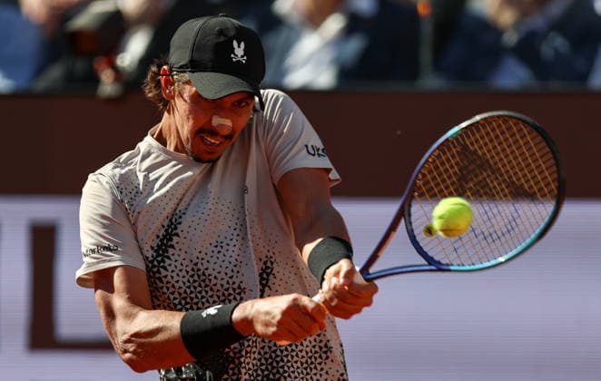 (260512) -- ROME, May 12, 2026 -- Alexei Popyrin hits a return during the men s singles round of 32 match between Jannik Sinner of Italy and Alexei Popyrin of Australia at the ATP, Tennis Herren Italian Open in Rome, Italy, May 11, 2026. ) (SP)ITALY-ROME-TENNIS-ATP-ITALIAN OPEN-MEN S SINGLES WangxKaiyan 