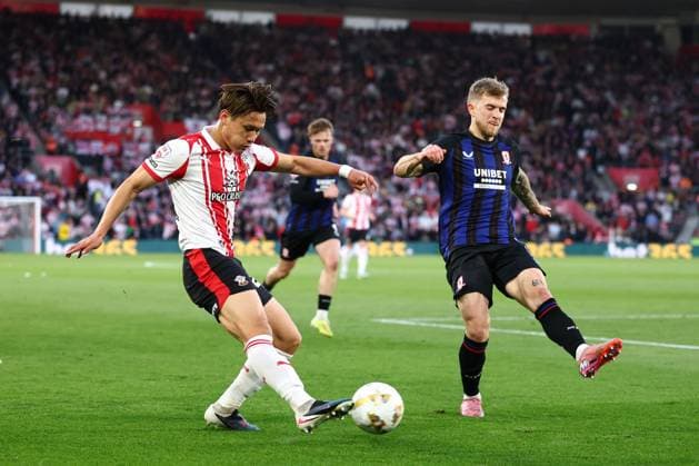 Kuryu Matsuki of Southampton under pressure from Riley McGree of Middlesbrough Southampton v Middlesbrough, EFL Sky Bet Championship, Play-Off Semi Final, Second Leg, Football, St Mary s Stadium, Southampton, UK - 12 May 2026Southampton St Mary s Stadium United Kingdom EDITORIAL USE ONLY No use with unauthorised audio, video, data, fixture lists, club league logos or live services. Online in-match use limited to 120 images, no video emulation. No use in betting, games or single club league player publications.  Copyright: xSimonxDael Shutterstockx 16871476ar