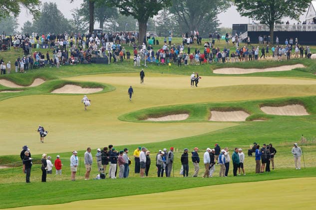 Spectators watch golfers on the 11th green during the first round of the 2026 PGA, Golf Herren Championship at Aronimink Golf Club in Newtown Square, Pennsylvania, on Thursday, May 14, 2026.  PHI20260514836 LAURENCExKESTERSON