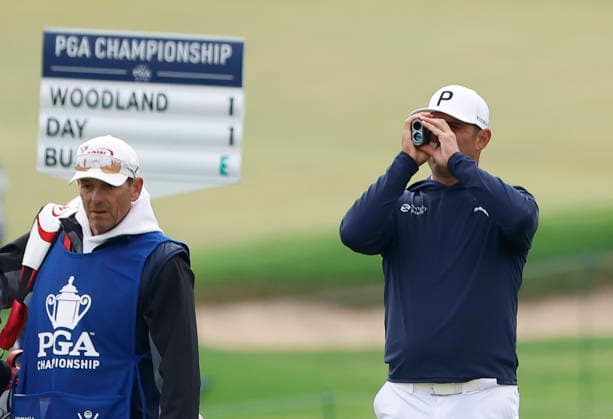 Gary Woodland uses a rangefinder on the 16th fairway during the first round of the 2026 PGA, Golf Herren Championship at Aronimink Golf Club in Newtown Square, Pennsylvania, on Thursday, May 14, 2026.  PHI20260514837 LAURENCExKESTERSON