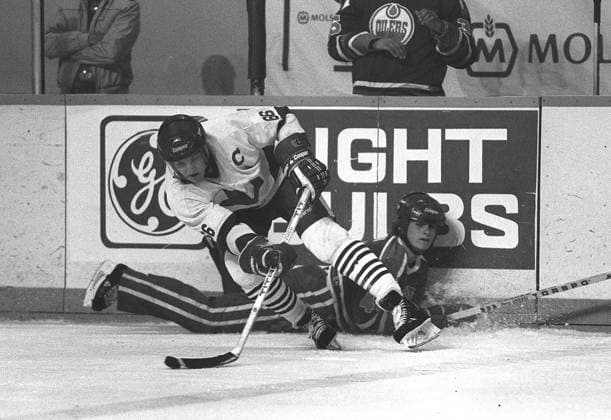 May 15, 1984, Kitchener, On, CANADA: Laval Voisins forward Mario Lemieux (66) leaves Kamloops Junior Oilers defenceman Rob Brown lying on the ice as he spins around during first-period Memorial Cup action in Kitchener, Ont., on May, 15, 1984. LEMIEUX KAMLOOPS  - ZUMAc35_ 19840515_zaf_c35_001 Copyright: xGaryxHershornx