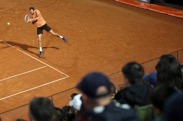(260515) -- ROME, May 15, 2026 -- Daniil Medvedev of Russia hits a return during the men s singles quarterfinal match between Martin Landaluce of Spain and Daniil Medvedev of Russia at the ATP, Tennis Herren Italian Open in Rome, Italy, May 14, 2026. ) (SP)ITALY-ROME-TENNIS-ATP-MARTIN LANDALUCE VS DANIIL MEDVEDEV LixJing 
