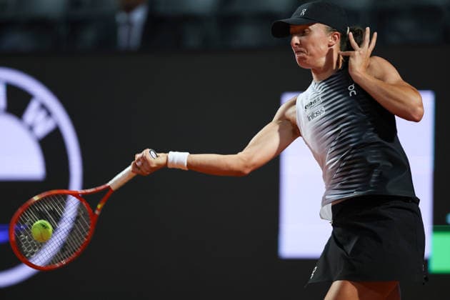 (260515) -- ROME, May 15, 2026 -- Iga Swiatek of Poland hits a return during the women s singles semifinal match between Elina Svitolina of Ukraine and Iga Swiatek of Poland at the WTA, Tennis Damen Italian Open in Rome, Italy, May 14, 2026. ) (SP)ITALY-ROME-TENNIS-WTA-ITALIAN OPEN-ELINA SVITOLINA VS IGA SWIATEK LixJing 