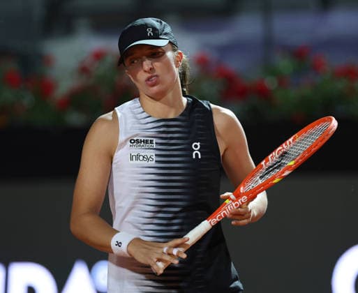 (260515) -- ROME, May 15, 2026 -- Iga Swiatek of Poland reacts after losing a point during the women s singles semifinal match between Elina Svitolina of Ukraine and Iga Swiatek of Poland at the WTA, Tennis Damen Italian Open in Rome, Italy, May 14, 2026. ) (SP)ITALY-ROME-TENNIS-WTA-ITALIAN OPEN-ELINA SVITOLINA VS IGA SWIATEK LixJing 